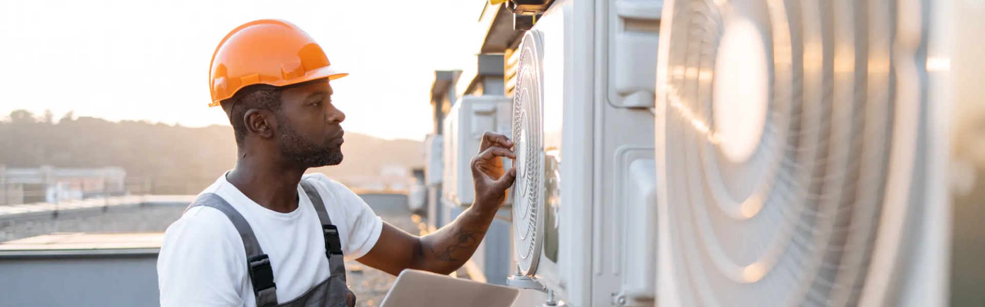 Technician performing regular HVAC maintenance to prevent costly system repairs.