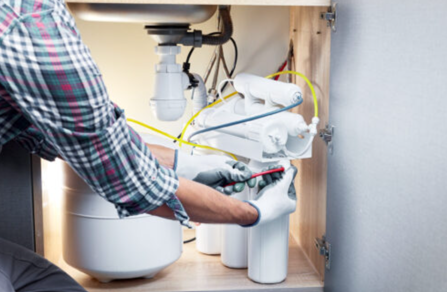 Home water filtration system installed in a modern kitchen providing cleaner, safer, great-tasting water for daily use